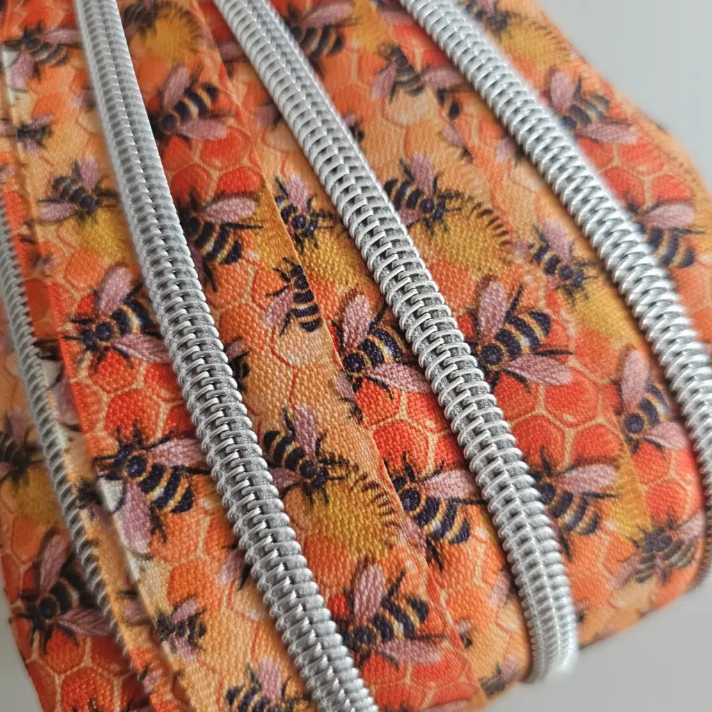 Endlosreißverschlüsse bedruckt Tier- und Blüten- Designs