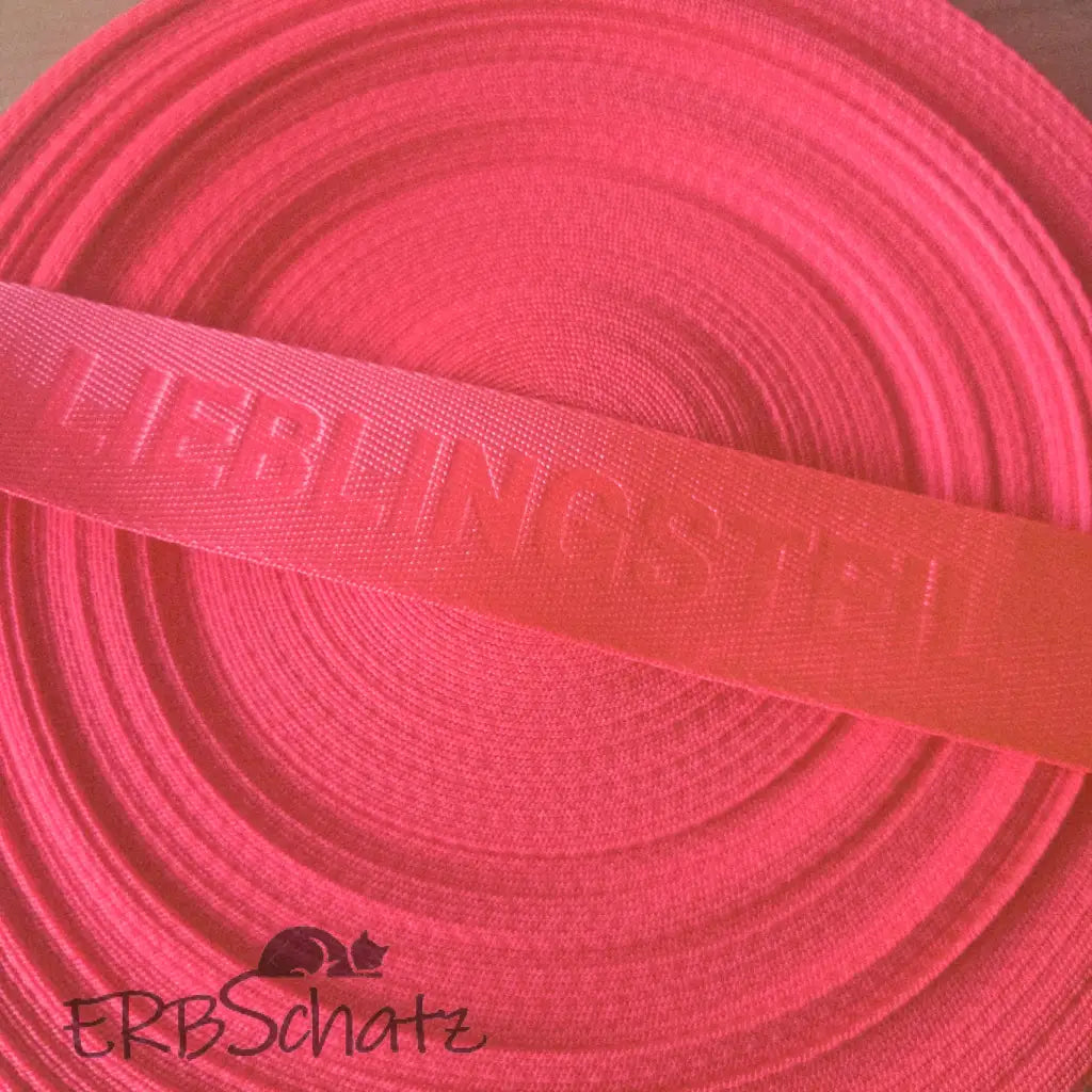 Gurtband embossed ’Lieblingsteil’ 38mm - Neon Pink