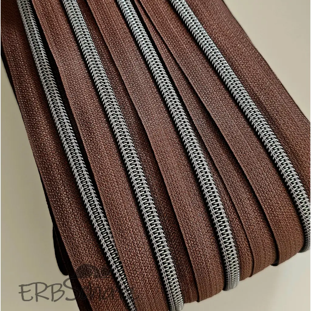 Endlosreißverschlüsse Gun Metal - Braun