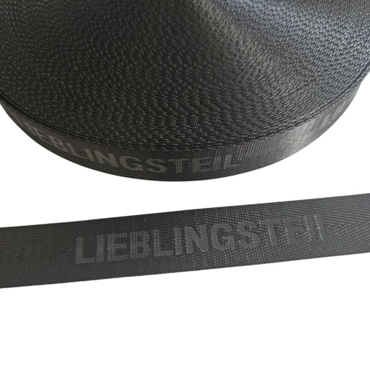 Gurtband Eigenproduktion embossed ’Lieblingsteil’ 25mm