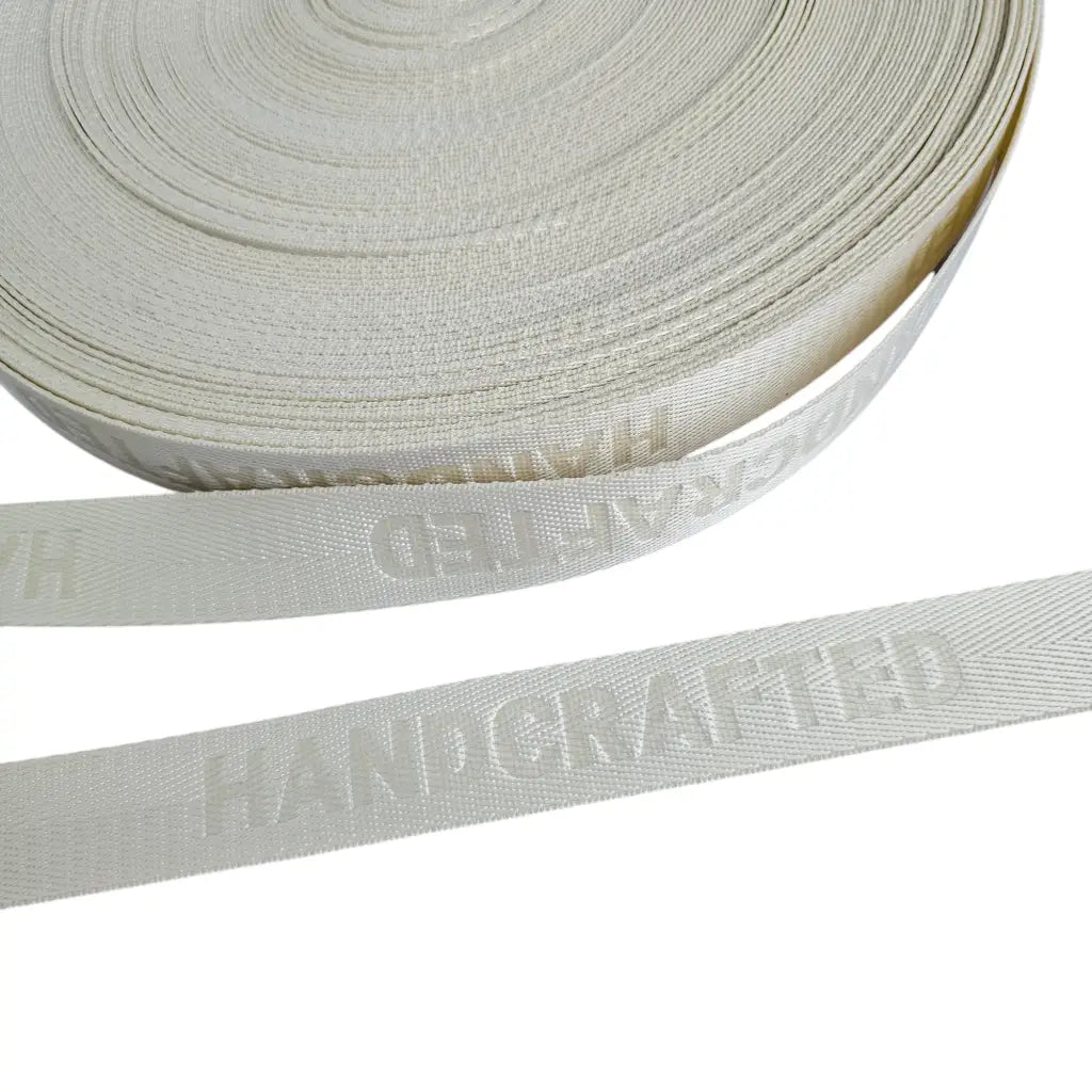 Gurtband embossed ’Handcrafted’ 25mm