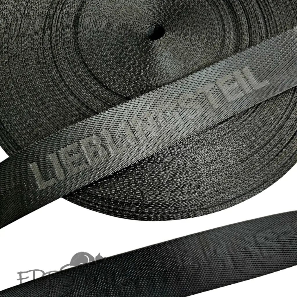 Gurtband embossed ’Lieblingsteil’ 38mm